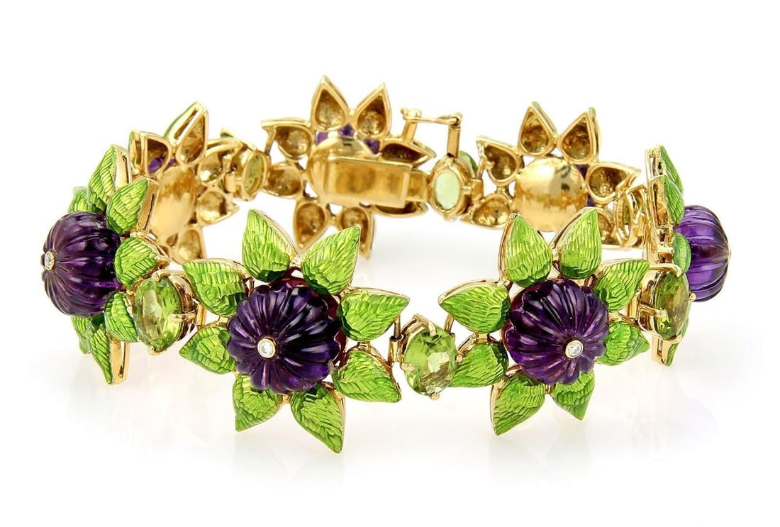 18k Yellow Gold Bracelet with Diamonds Amethyst Peridot and Green Enamel Floral Links: 18k Yellow Gold Bracelet with Diamonds Amethyst Peridot and Green Enamel Floral Links This bracelet features a combination of diamond, amethyst, and peridot stones set in 18k yellow gold with green en