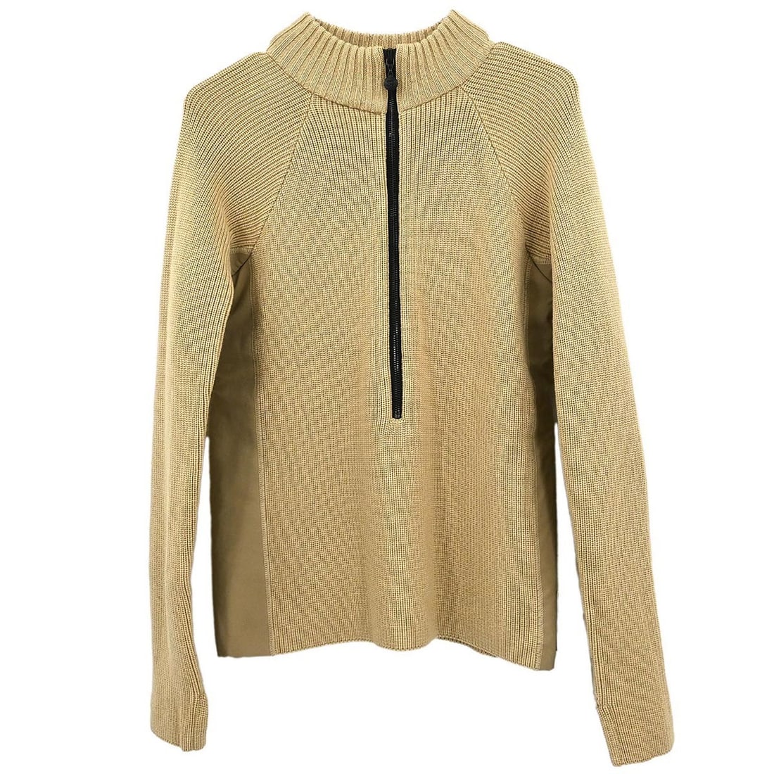 Chanel Vintage Beige Wool Sport Line T-Shirt Size 38: Chanel Vintage Beige Wool Sport Line T-Shirt Size 38 Elevate your casual wardrobe with this vintage Chanel Sport Line Top in a classic beige hue. Crafted from 100% wool, this long sleeve t-shirt featu