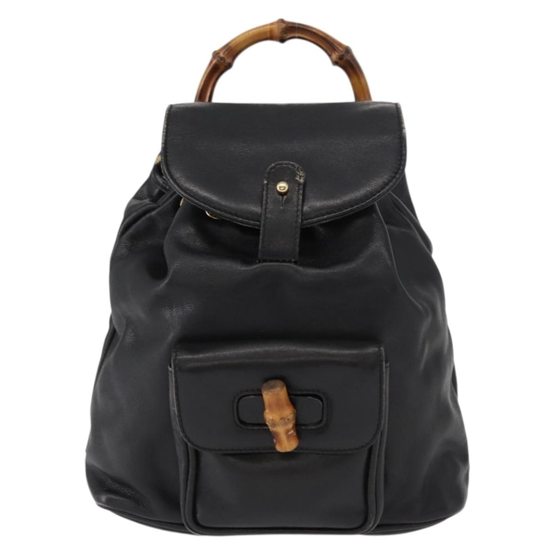 Black Leather Gucci Bamboo Backpack Vintage Design: Black Leather Gucci Bamboo Backpack Vintage Design This vintage Gucci Bamboo Backpack is crafted from black leather, designed for women. It features the iconic bamboo handle and offers a stylish, func