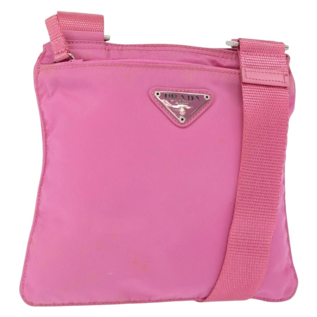 Pink Nylon Messenger Bag Prada Front Pocket 20cm by 19cm by 20cm: Pink Nylon Messenger Bag Prada Front Pocket 20cm by 19cm by 20cm This Prada Front Pocket Messenger Bag designed for women features a pink nylon construction with a compact size ideal for daily use. Th