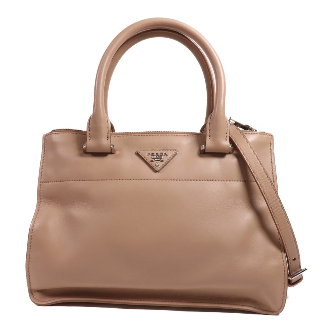 PRADA BN2844 Beige Calfskin 2 Way Shoulder Bag: PRADA BN2844 Beige Calfskin 2 Way Shoulder Bag This exquisite PRADA 2 Way Shoulder Bag is crafted from premium calfskin leather in a sophisticated beige hue. With its versatile design, this handbag ca