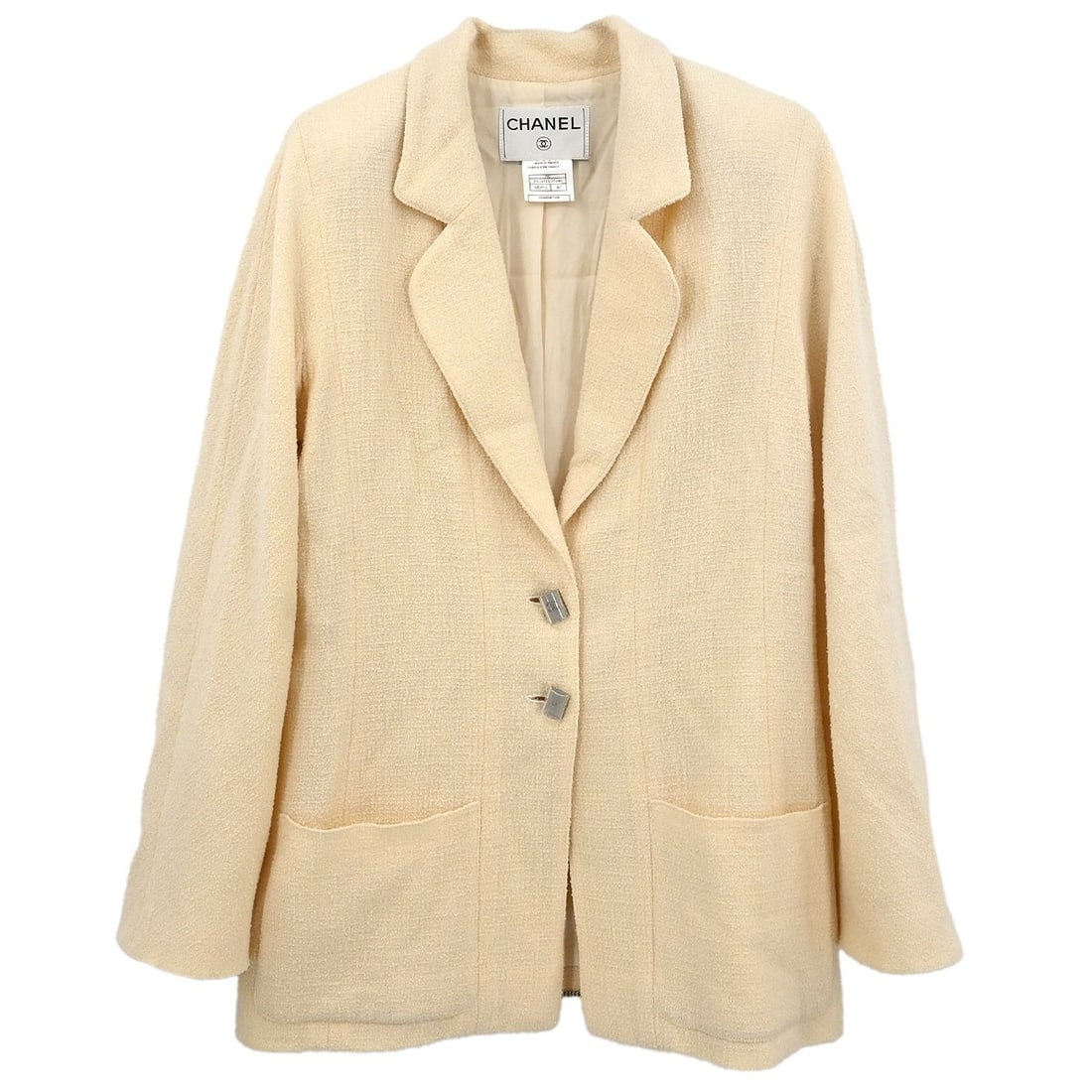 Chanel Vintage White Single Breasted Jacket #40: Chanel Vintage White Single Breasted Jacket #40 Elevate your wardrobe with this vintage Chanel single-breasted jacket, crafted from a premium blend of 90% wool and 10% nylon, ensuring both comfort and