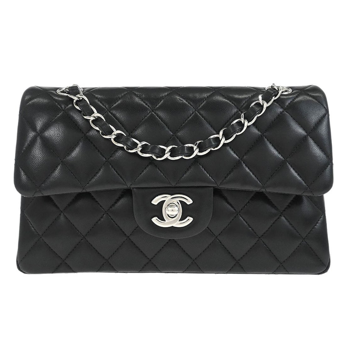 Small Classic Double Flap Shoulder Bag in Black Lambskin by Chanel: Small Classic Double Flap Shoulder Bag in Black Lambskin by Chanel This Chanel Classic Double Flap shoulder bag is crafted from black lambskin leather with a matelasse pattern. It features a flap turn