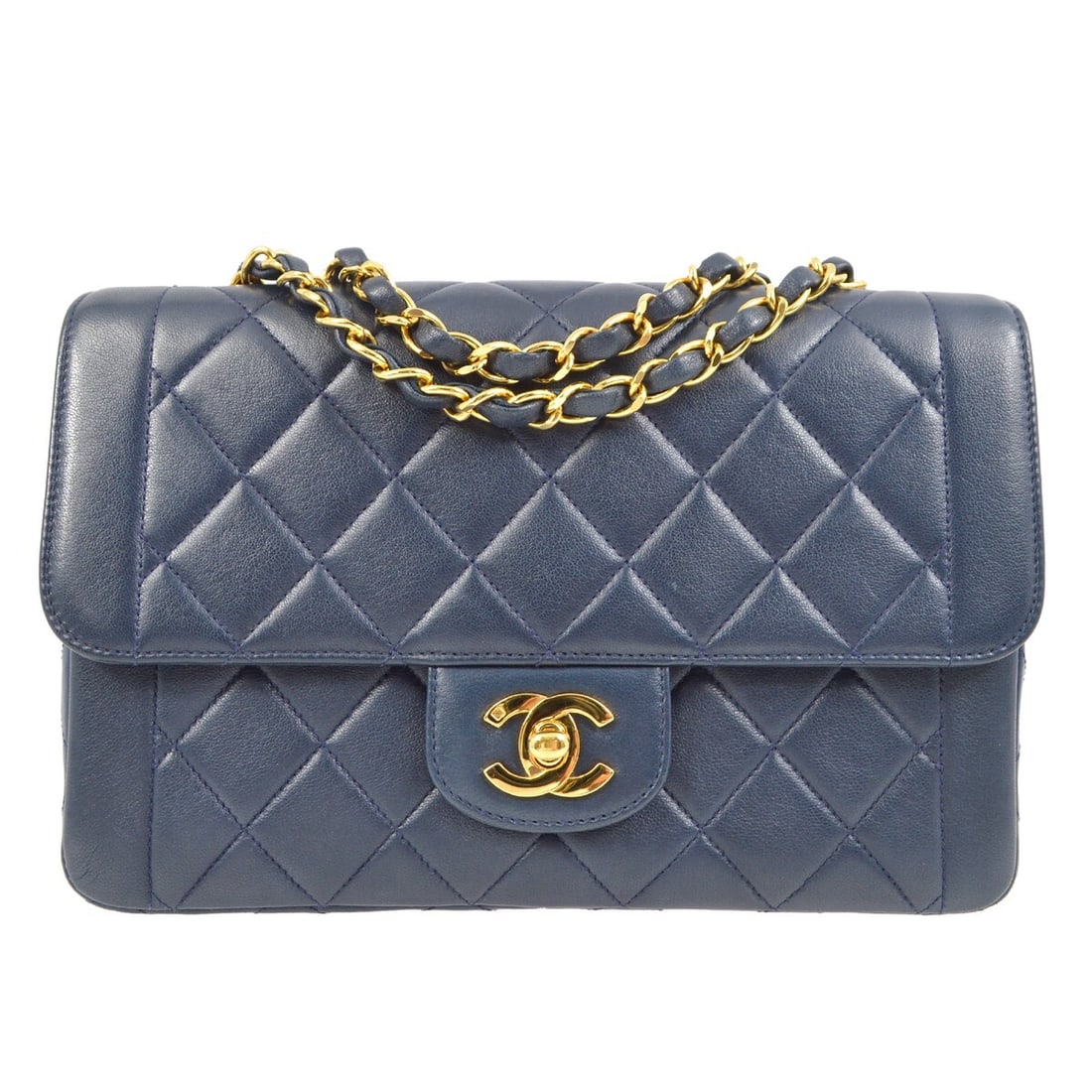 Chanel Classic Single Flap Navy Lambskin Shoulder Bag: Chanel Classic Single Flap Navy Lambskin Shoulder Bag This exquisite Chanel Navy Lambskin Small Single Flap Shoulder Bag is a timeless accessory, perfect for any occasion. Crafted from luxurious lambs