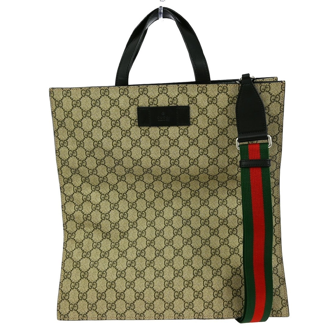 Gucci GG Beige PVC Vintage 2-Way Top Handle Shoulder Bag 256217: Gucci GG Beige PVC Vintage 2-Way Top Handle Shoulder Bag 256217 This Gucci GG 2-way handbag features a beige GG PVC exterior with brown leather accents. Designed with double handles, it offers both ha