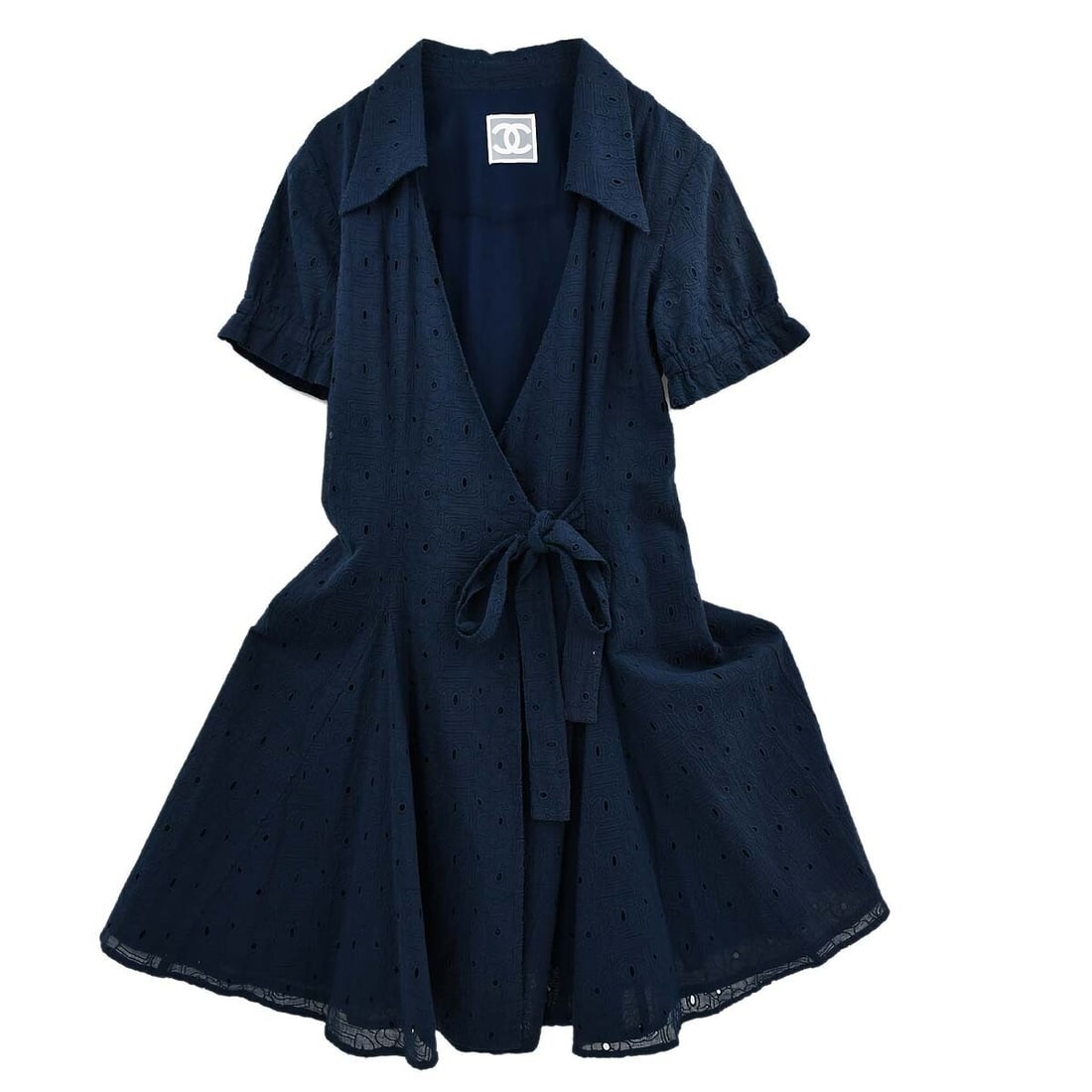 Chanel Sport Line Navy Short Sleeve Midi Dress Size 38: Chanel Sport Line Navy Short Sleeve Midi Dress Size 38 Elevate your summer wardrobe with this elegant Chanel Sport Line Short Sleeve Dress in a rich navy hue. Designed with a flattering V-neck and sho