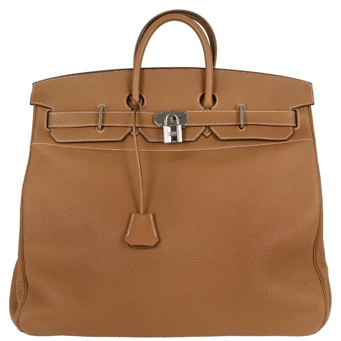 Hermes Gold Taurillon Clemence Haut a Courroies 50 Handbag Brown: Hermes Gold Taurillon Clemence Haut a Courroies 50 Handbag Brown Introducing the luxurious Hermes Haut a Courroies 50 handbag, exquisitely crafted from Taurillon Clemence leather in a rich brown hue.