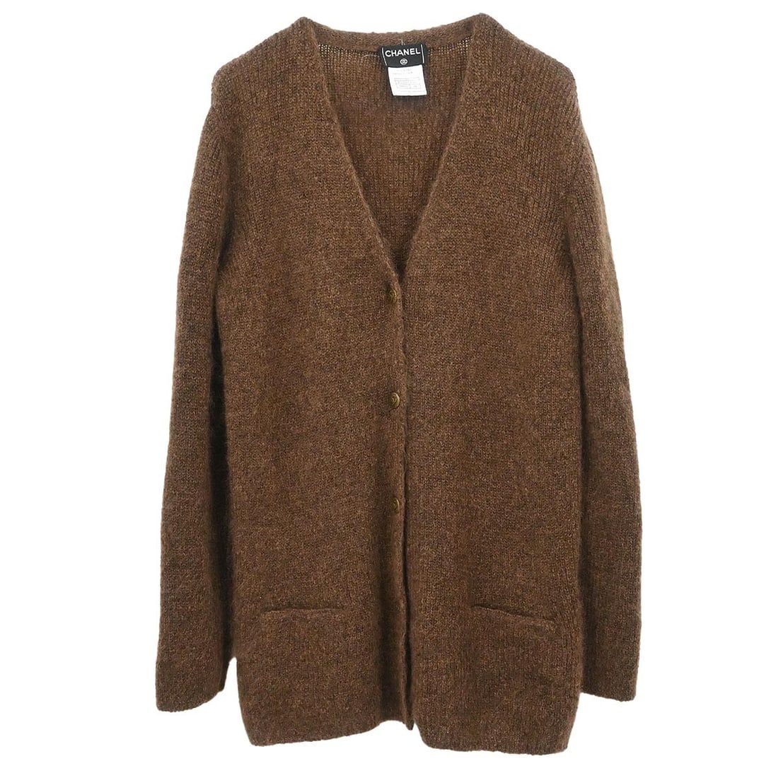 Brown Mohair Knit Chanel Long Sleeve Cardigan Size 44: Brown Mohair Knit Chanel Long Sleeve Cardigan Size 44 This vintage Chanel cardigan is crafted from a luxurious blend of 70% mohair and 30% nylon, offering a soft knit texture in a rich brown hue. Feat