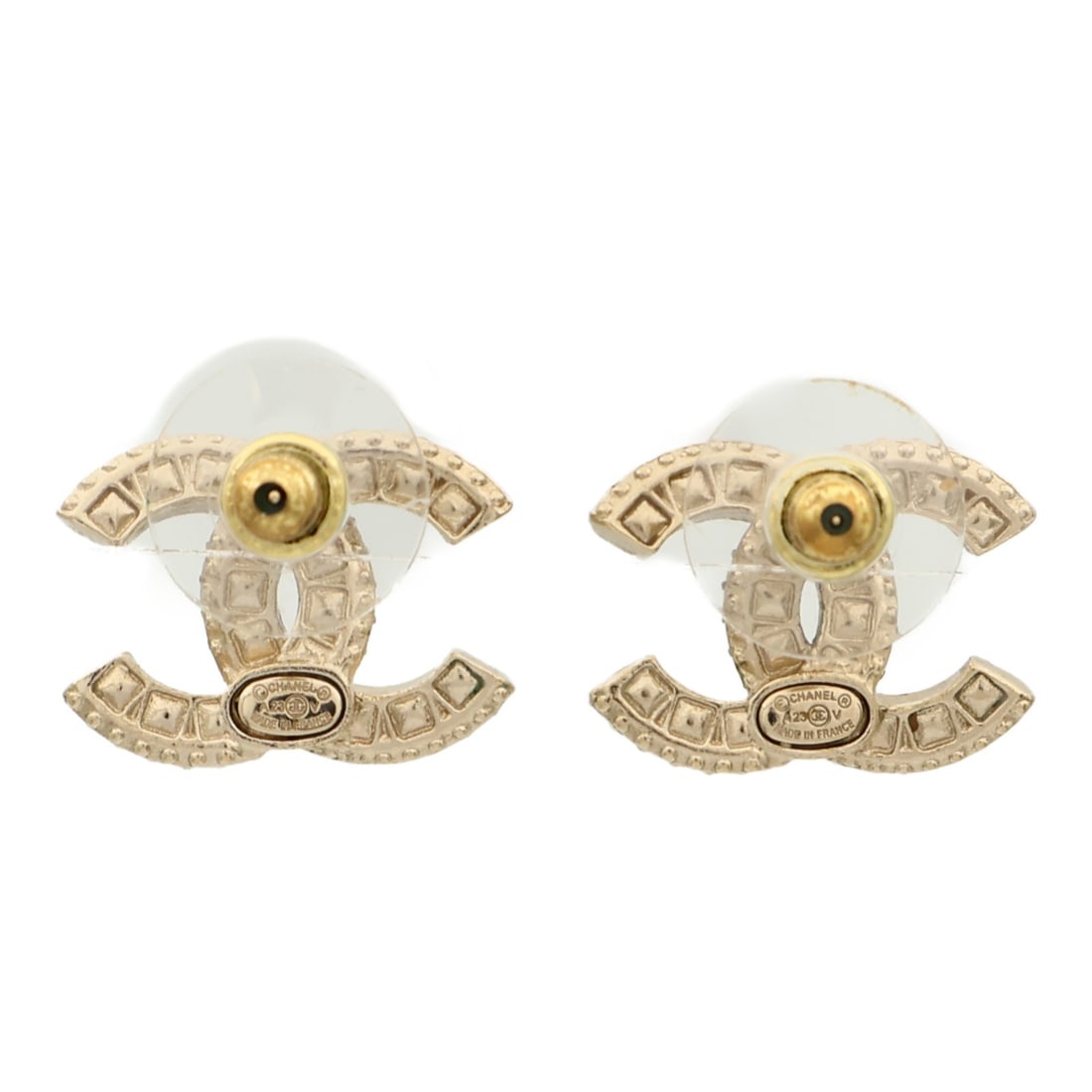 Gold Tone Pierced Earrings with CC Motif by CHANEL: Gold Tone Pierced Earrings with CC Motif by CHANEL These CHANEL CC pierced earrings feature a gold-tone finish and are crafted from unspecified metal. Designed in a regular size and made in France, th
