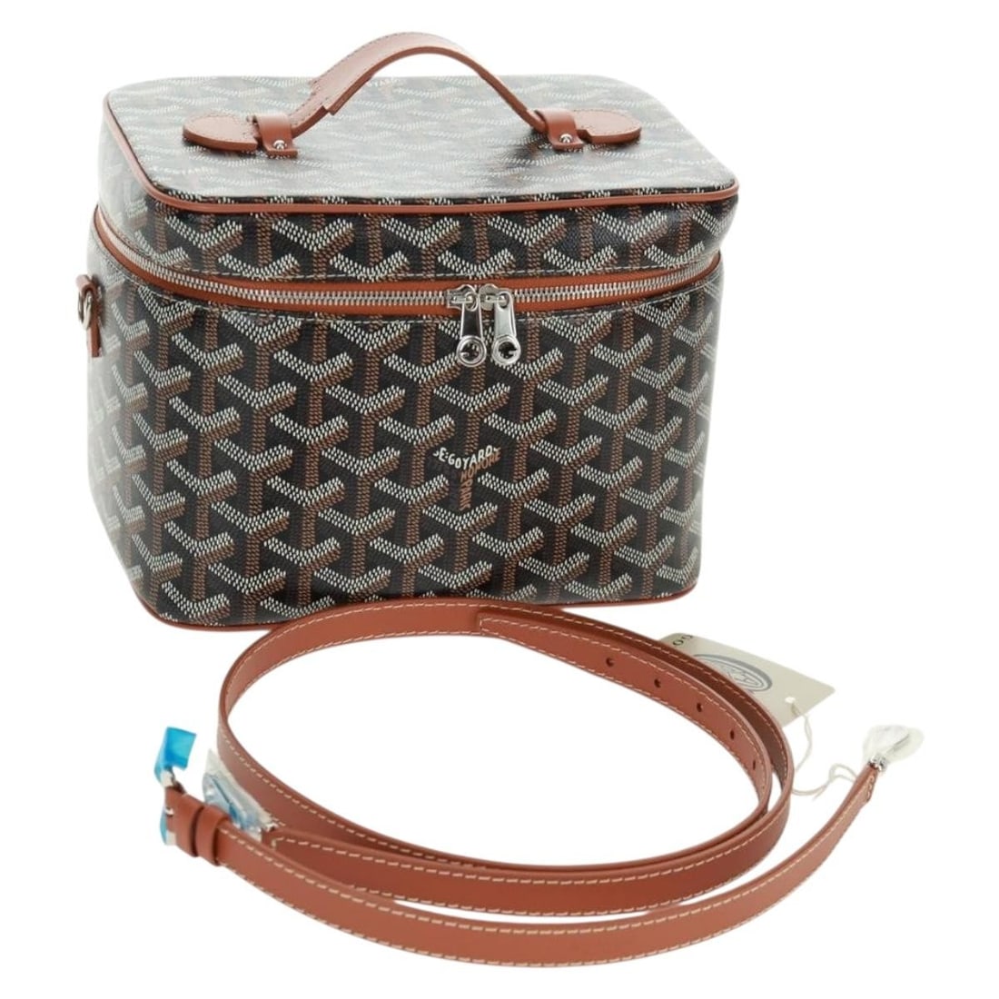 Goyard Muse PM Vanity Herringbone 2way Brown PVC Leather Handbag: Goyard Muse PM Vanity Herringbone 2way Brown PVC Leather Handbag This authentic GOYARD Vanity Muse PM handbag features a brown and silver herringbone pattern crafted from durable PVC leather. Designed