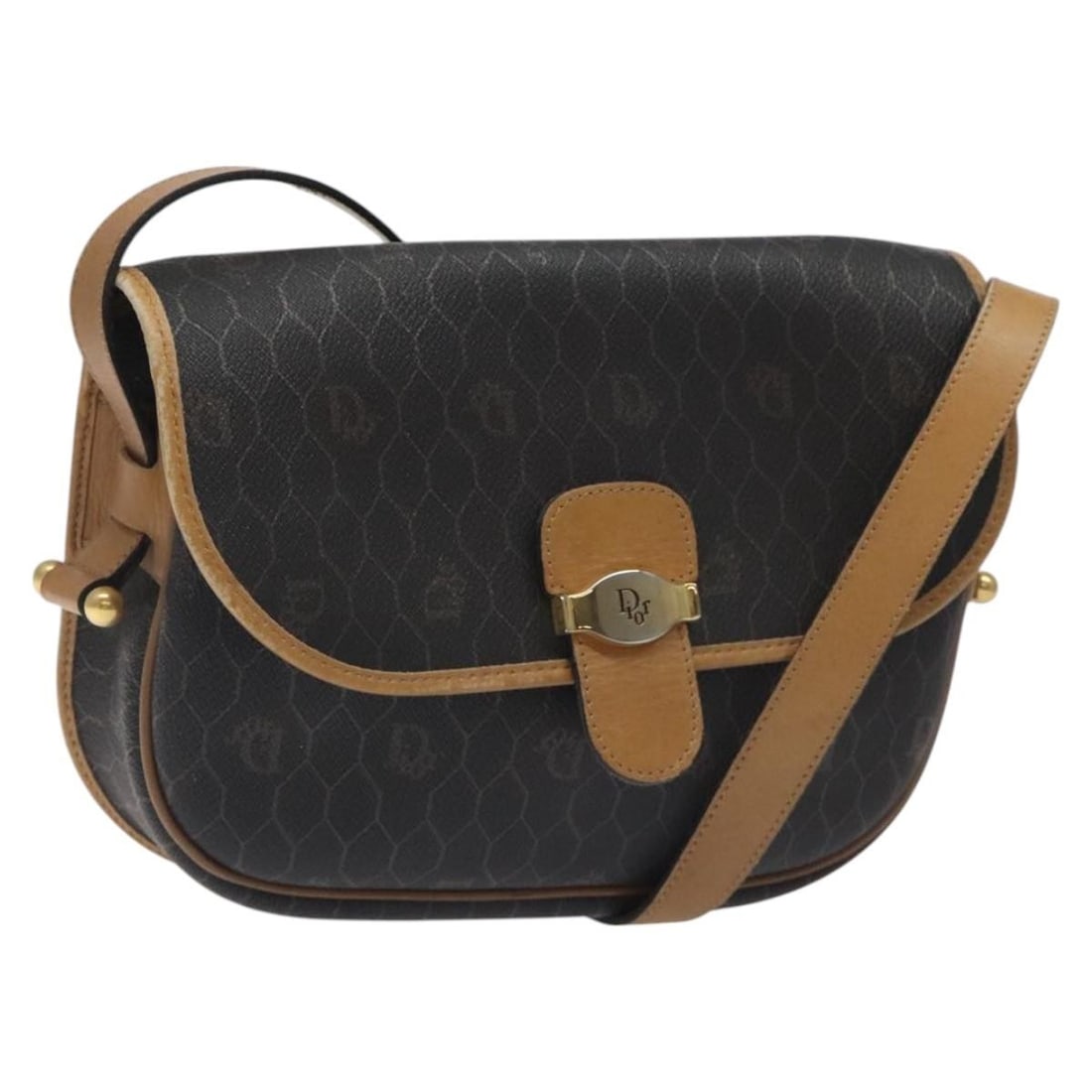 Christian Dior Honeycomb Black Canvas Vintage Crossbody Flap Bag: Christian Dior Honeycomb Black Canvas Vintage Crossbody Flap Bag This Christian Dior Vintage Honeycomb Flap Crossbody Bag is crafted from black coated canvas and features the iconic honeycomb pattern.