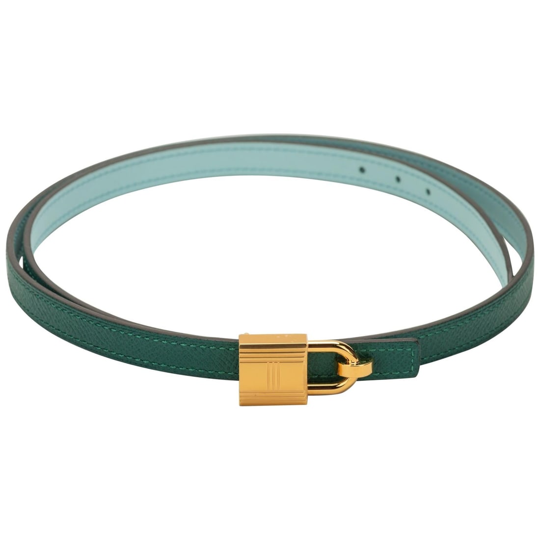 Hermes Reversible Green Epsom Blue Atolle Belt with Rose Gold Buckle: Hermes Reversible Green Epsom Blue Atolle Belt with Rose Gold Buckle Introducing a striking reversible thin belt from Hermes, crafted in exquisite green epsom leather and blue atolle swift. This elega