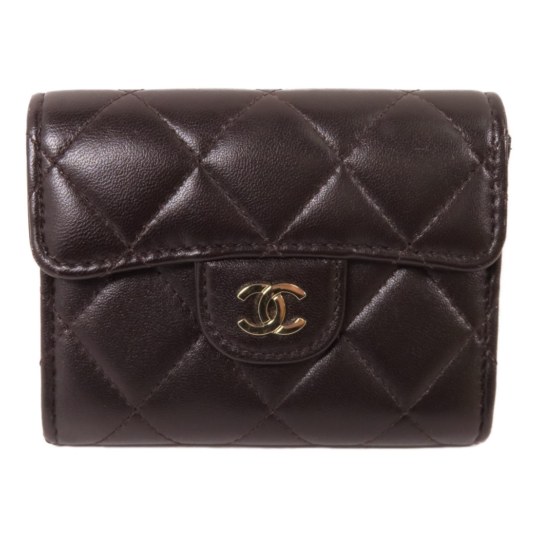 Chanel Lambskin Brown Card Holder with Gold Tone CC Logo: Chanel Lambskin Brown Card Holder with Gold Tone CC Logo This CHANEL card case is crafted from luxurious lambskin leather in dark brown, featuring gold-tone CC hardware. Designed for everyday use, it