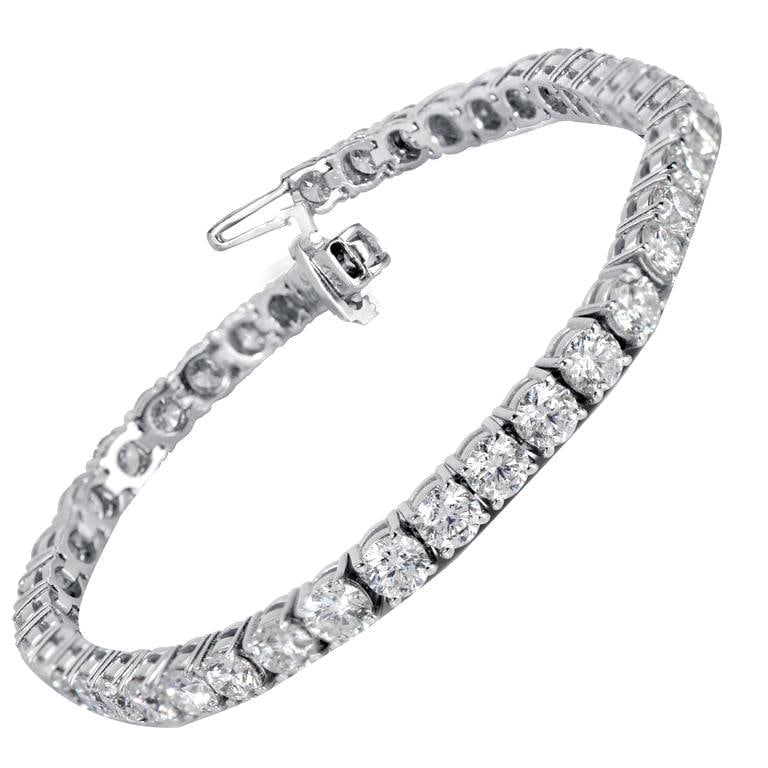 10 Carat Diamond Tennis Bracelet in 14K White Gold by Harbor Diamonds: 10 Carat Diamond Tennis Bracelet in 14K White Gold by Harbor Diamonds This exquisite diamond tennis bracelet showcases 41 round brilliant diamonds, totaling 10 carats, elegantly set in luxurious 14 ka