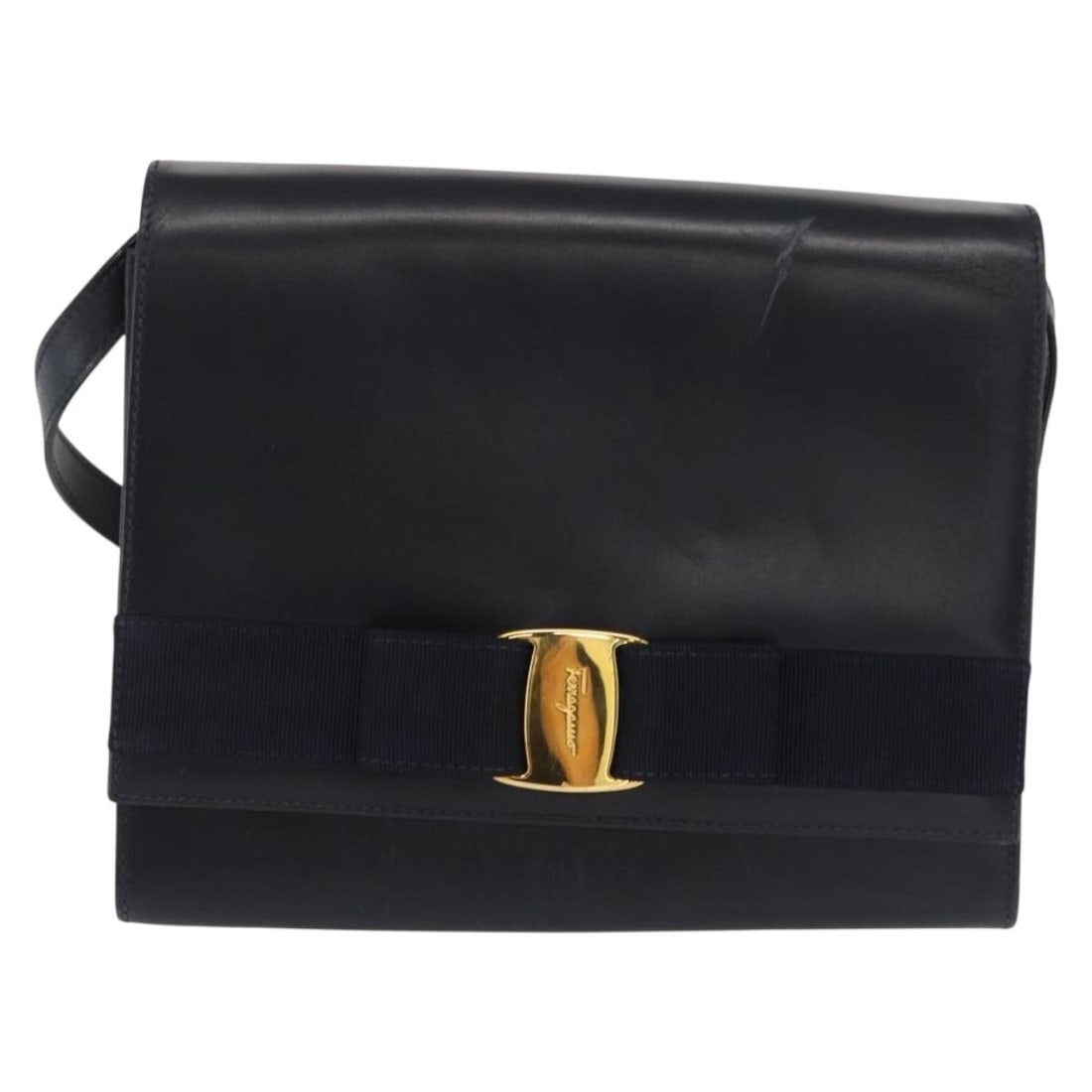 Navy Leather Vala Shoulder Bag by Salvatore Ferragamo: Navy Leather Vala Shoulder Bag by Salvatore Ferragamo This Salvatore Ferragamo Vala shoulder bag is crafted from navy leather and designed for women. It features metal fittings and a shoulder strap. T
