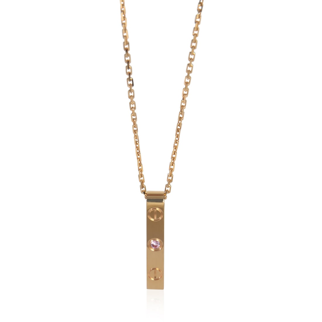 Cartier Love Bar 18k Rose Gold Pendant with Pink Sapphire and Box: Cartier Love Bar 18k Rose Gold Pendant with Pink Sapphire and Box This Cartier Love Bar pendant features a round pink sapphire set in 18k rose gold. The unisex design comes from the Love Bar collectio