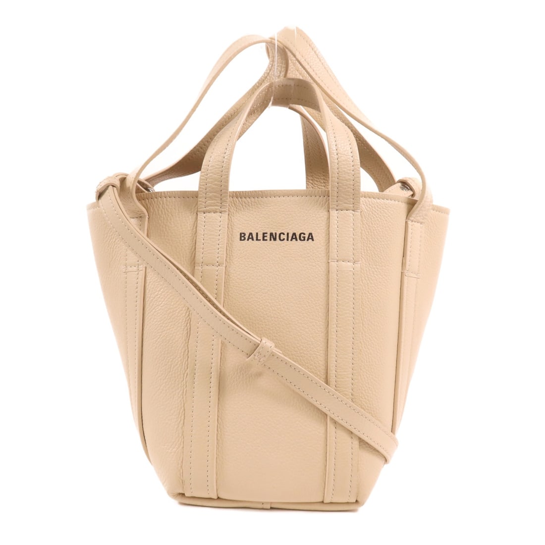 BALENCIAGA Everyday XS 2 Way Shoulder Bag Beige Calfskin: BALENCIAGA Everyday XS 2 Way Shoulder Bag Beige Calfskin This BALENCIAGA Everyday XS 2 Way Shoulder Handbag is a sophisticated accessory crafted from premium calfskin leather in a stylish beige hue. D