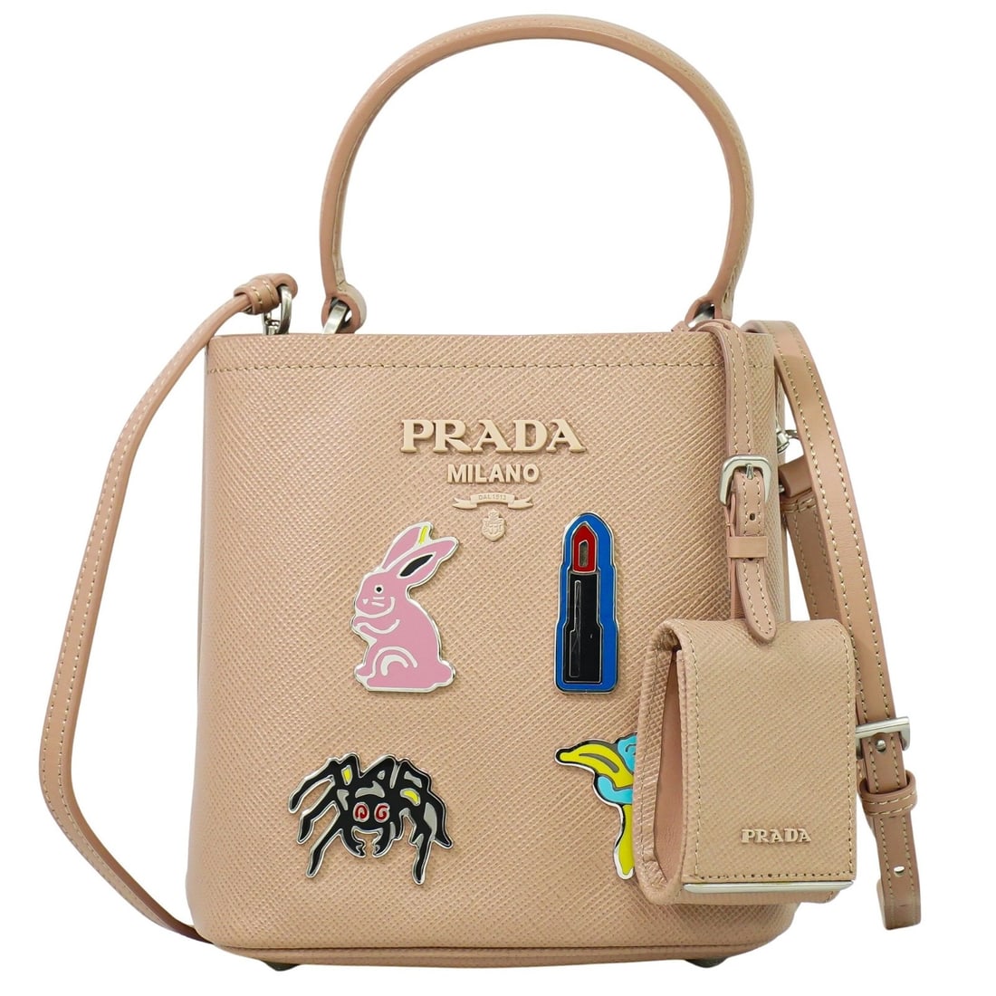 Beige Saffiano Leather Panier Bucket Bag by Prada: Beige Saffiano Leather Panier Bucket Bag by Prada This Prada Panier Bucket Bag is crafted from Saffiano leather in a beige color. Designed for women, it features a structured silhouette and offers amp