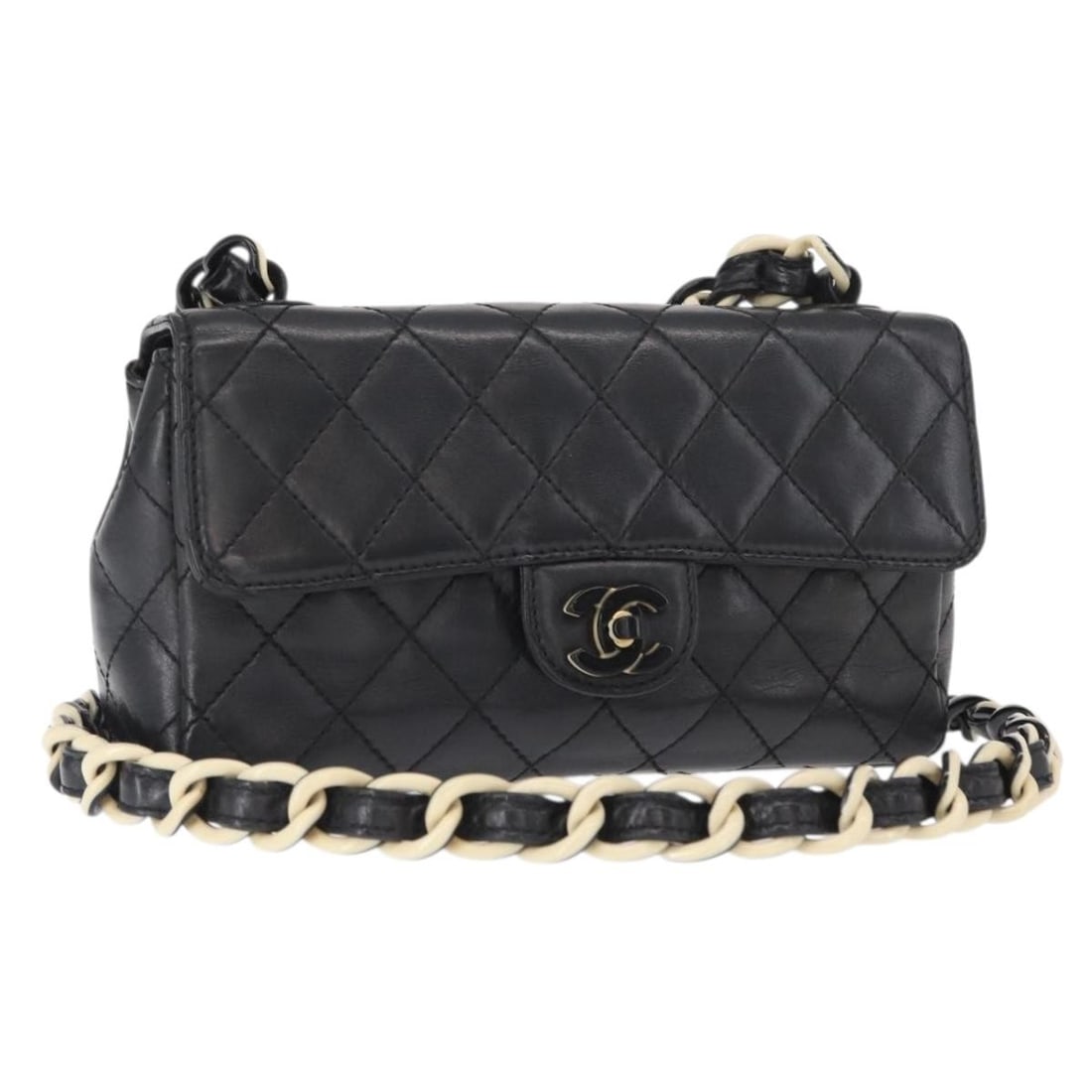 Chanel Quilted Lambskin Leather Flap Bag with Resin Chain Strap: Chanel Quilted Lambskin Leather Flap Bag with Resin Chain Strap This Chanel vintage flap bag features a black quilted lambskin leather exterior paired with a resin chain and CC logo flap closure. Desi