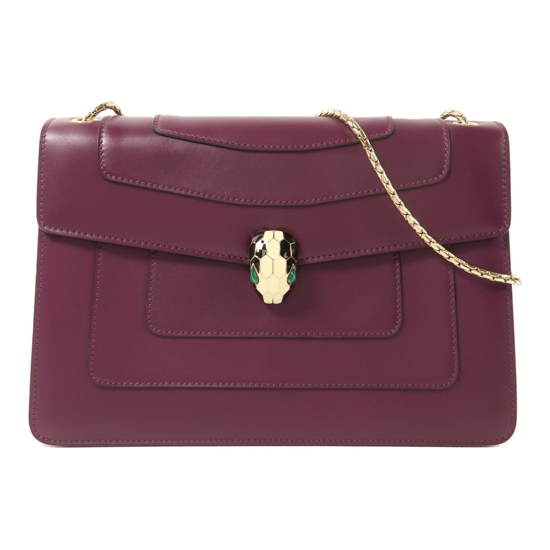 Purple Calfskin BVLGARI Serpenti Forever Shoulder Chain Bag: Purple Calfskin BVLGARI Serpenti Forever Shoulder Chain Bag This BVLGARI Serpenti Forever chain shoulder bag features luxurious calfskin leather in a striking purple hue. Crafted in Italy, the bag off