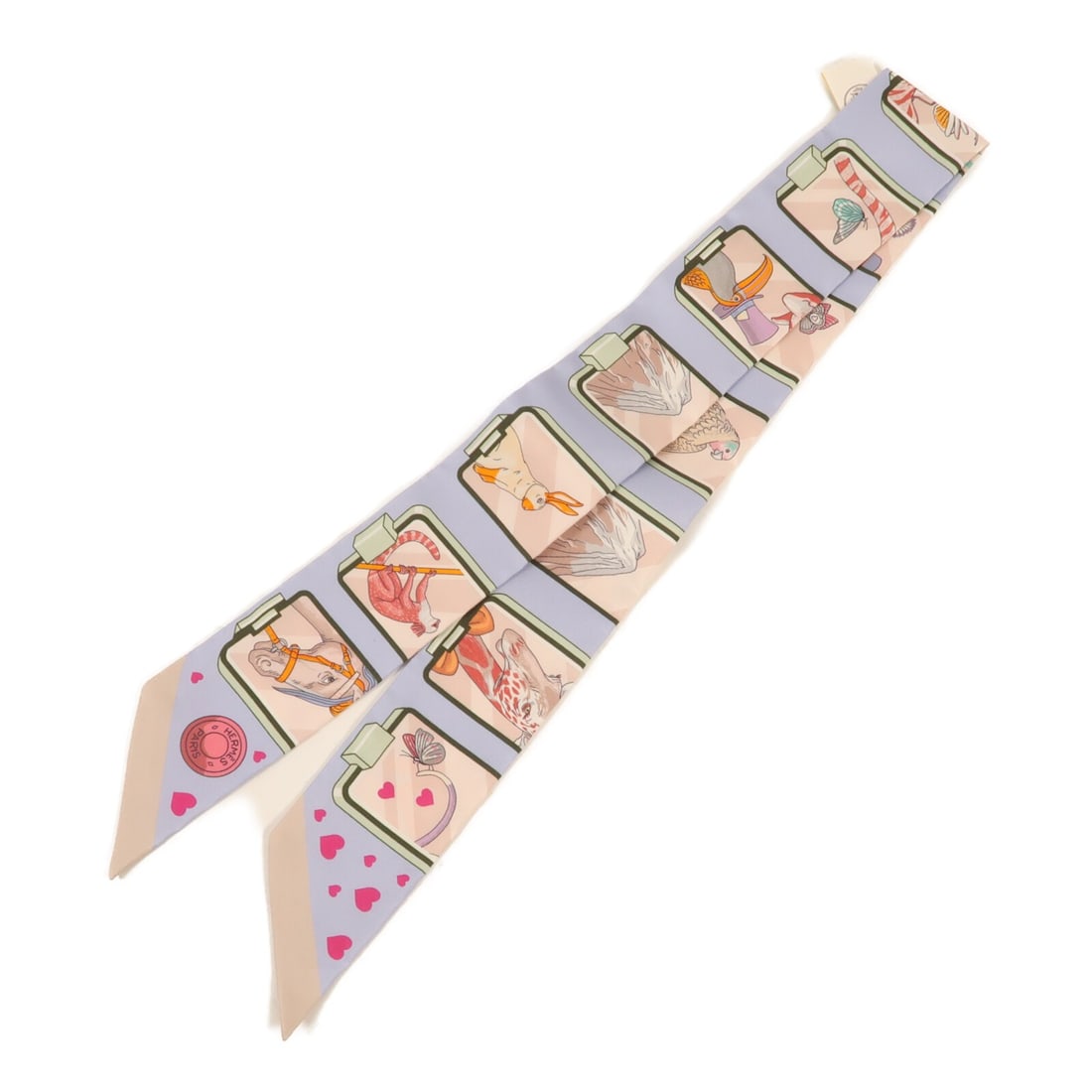 HERMES Multicolor Silk Twilly Scarf Made in France: HERMES Multicolor Silk Twilly Scarf Made in France Elevate your accessory collection with this exquisite HERMES Twilly Scarf. Crafted from luxurious silk, this multicolor scarf showcases a vibrant and