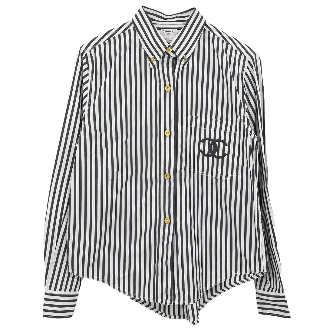 Black Long Sleeve Collared Cotton Blouse by Chanel: Black Long Sleeve Collared Cotton Blouse by Chanel This vintage Chanel blouse features a classic collared neckline, long sleeves, and button closure. Made from 100% cotton in black, it offers a regula