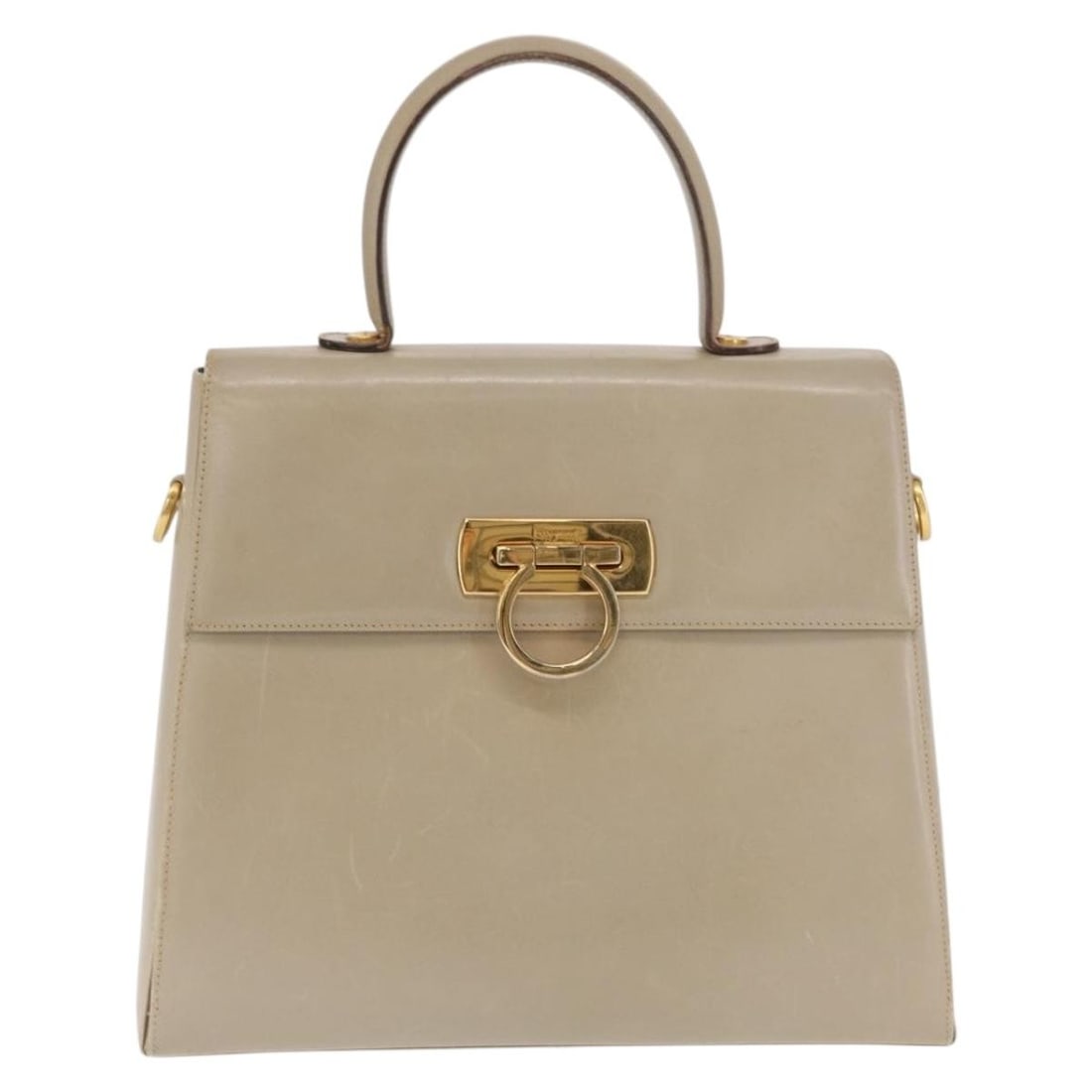 Salvatore Ferragamo Gancini Leather Convertible Top Handle Bag Beige: Salvatore Ferragamo Gancini Leather Convertible Top Handle Bag Beige Salvatore Ferragamo Gancini Convertible Top Handle Bag in beige leather designed for women. The bag features a convertible top hand