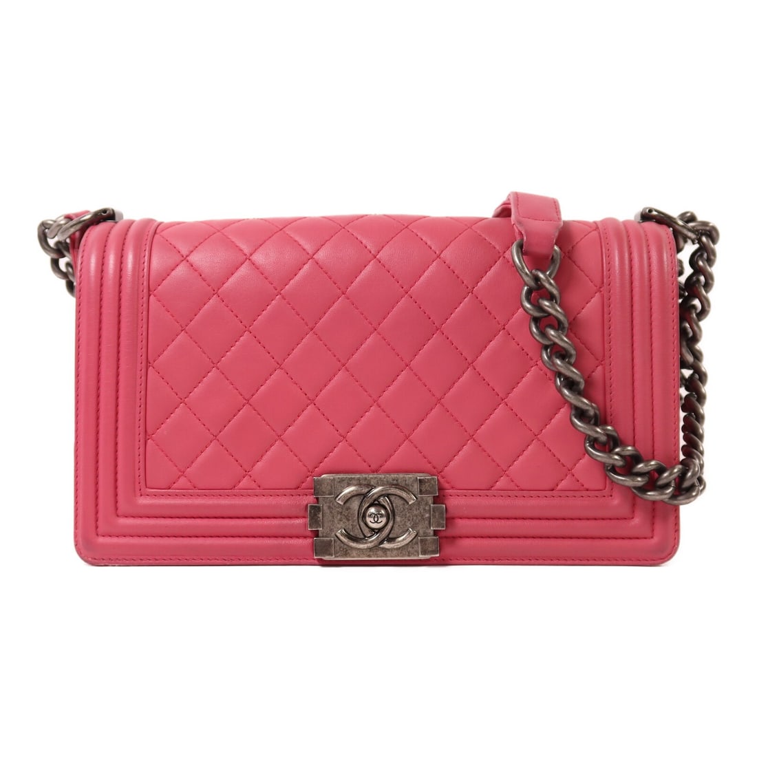 Pink Lambskin CHANEL Boy 25 Chain Shoulder Bag with Silver Tone Hardware: Pink Lambskin CHANEL Boy 25 Chain Shoulder Bag with Silver Tone Hardware This CHANEL Boy 25 chain shoulder bag is crafted from pink lambskin leather and features silver-tone hardware. The bag is desig