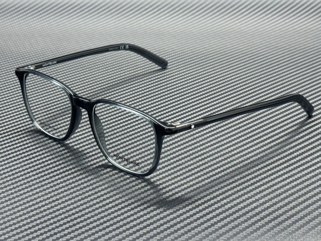 Montblanc MB0386O 002 Grey Transparent 52mm Men's Eyeglasses: Montblanc MB0386O 002 Grey Transparent 52mm Men's Eyeglasses Introducing the Montblanc MB0386O 002 Grey Transparent Men's Eyeglasses, a perfect blend of style and functionality. These eyeglasses featu