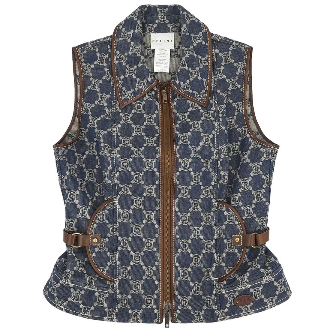 Celine Macadam Pattern Blue Denim Sleeveless Jacket Size FR 40: Celine Macadam Pattern Blue Denim Sleeveless Jacket Size FR 40 This Celine sleeveless denim jacket features the signature Macadam pattern and is crafted from 100% cotton. It has a mid-length cut, coll