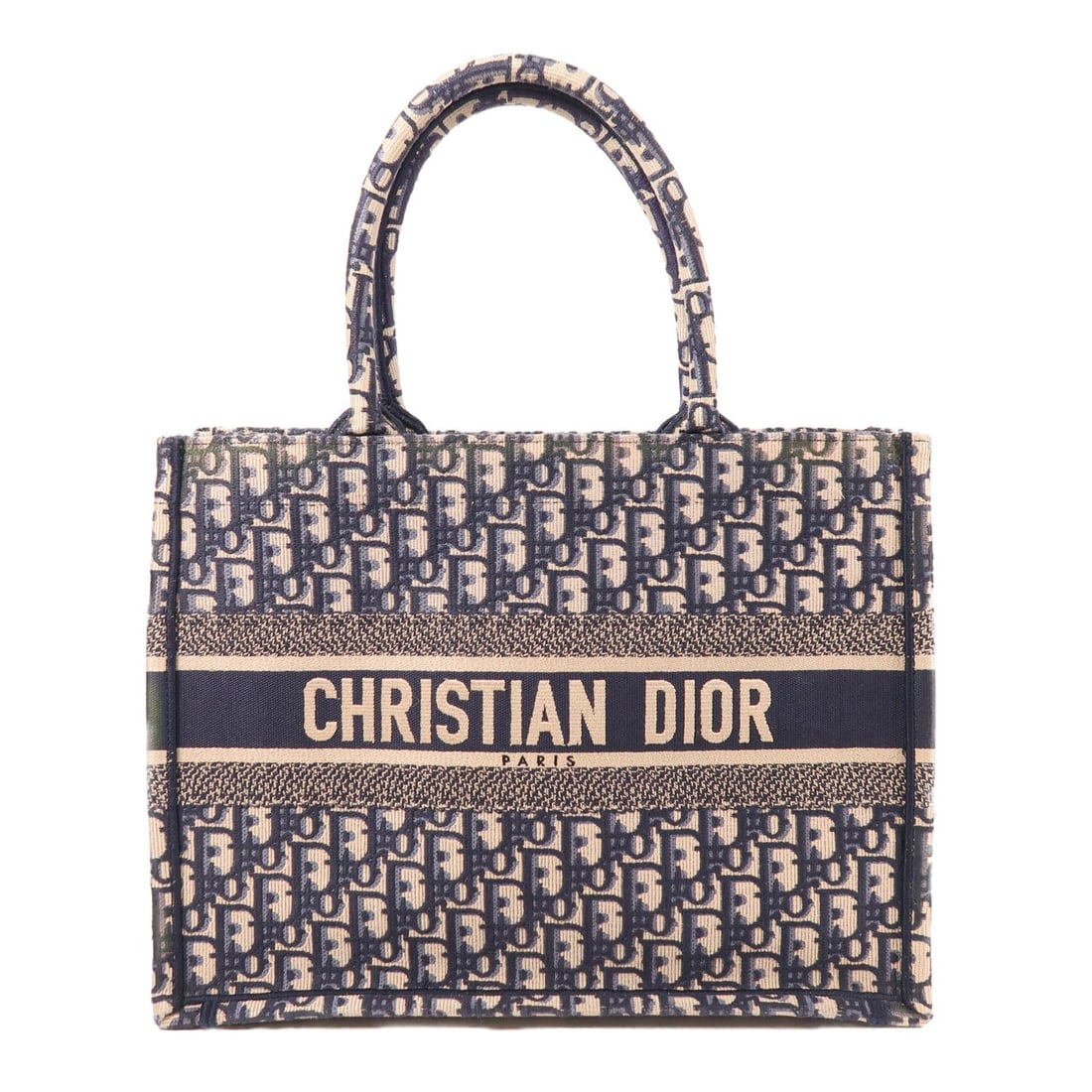 Dior Book Tote Blue Canvas Handbag from France: Dior Book Tote Blue Canvas Handbag from France This Christian Dior Book Tote handbag is crafted from blue canvas and features a spacious design. Made in France, it is designed for regular use and show