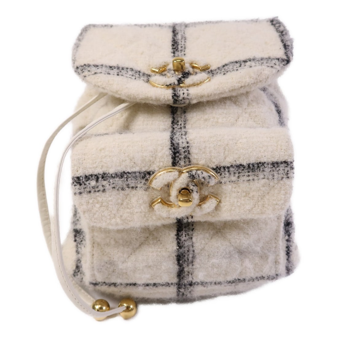 Chanel Duma 22K Gold Hardware White Tweed CC Rucksack Backpack: Chanel Duma 22K Gold Hardware White Tweed CC Rucksack Backpack This CHANEL Duma backpack features a classic rucksack design in white tweed with gold tone hardware. The backpack is crafted with a regul