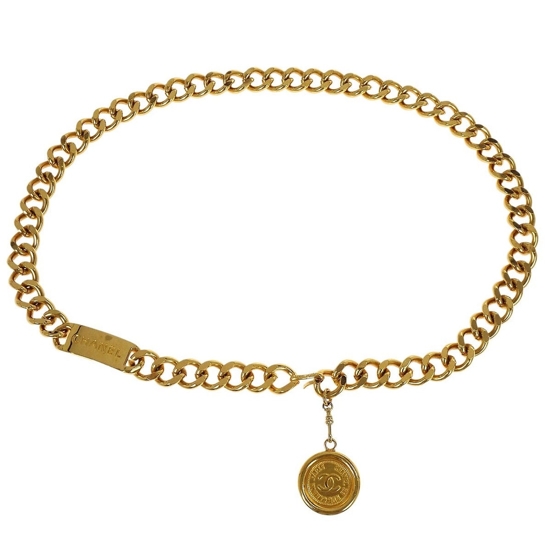 Small Gold-Plated Chain Belt with Medallion by Chanel: Small Gold-Plated Chain Belt with Medallion by Chanel This Chanel medallion chain belt features a gold-plated finish and a classic chain design. Made in France, it is presented in very good condition