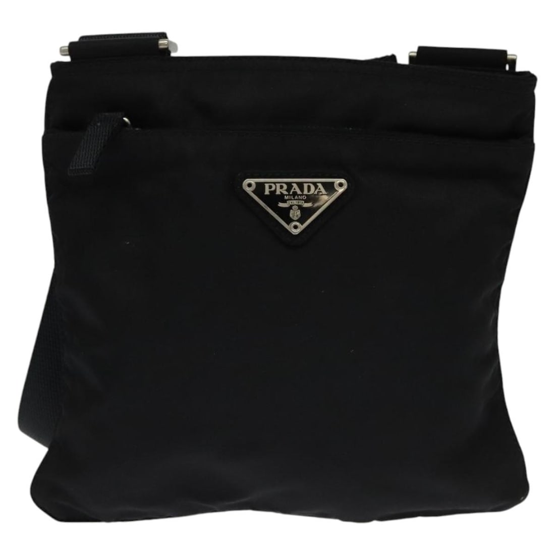 Prada Black Nylon Front Pocket Messenger Bag Unisex Italy: Prada Black Nylon Front Pocket Messenger Bag Unisex Italy This Prada Front Pocket Messenger Bag features a sleek black nylon construction and a practical front pocket design. Suitable for both men and