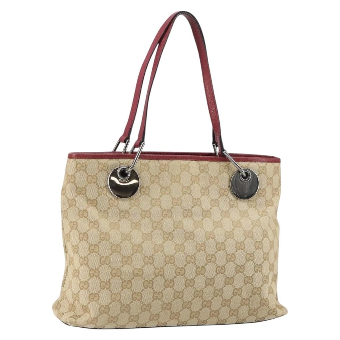 Medium Beige Canvas Eclipse Tote Bag by Gucci: Medium Beige Canvas Eclipse Tote Bag by Gucci This is a Gucci Eclipse Tote Medium designed for women, crafted from beige canvas with leather trim. The bag is made in Italy and features a spacious inte