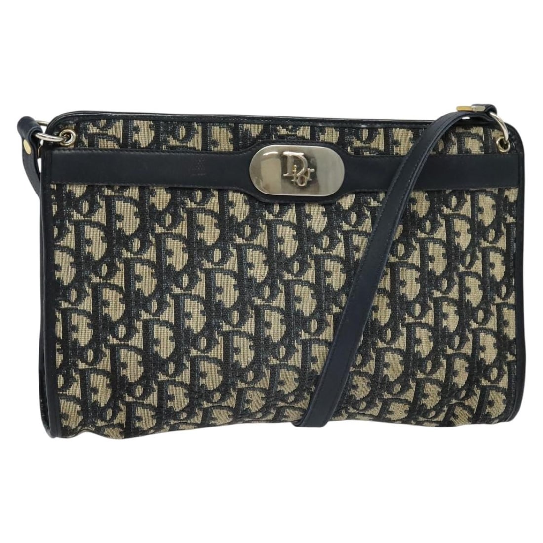 Christian Dior Canvas Navy Vintage Trotter Shoulder Handbag: Christian Dior Canvas Navy Vintage Trotter Shoulder Handbag This Christian Dior Vintage Trotter shoulder bag features navy canvas construction designed for women. The bag shows signs of wear including