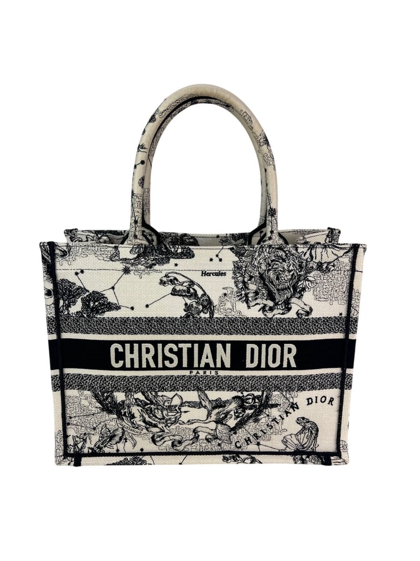 Christian Dior Book Tote Embroidered Canvas Stars Black 14 in: Christian Dior Book Tote Embroidered Canvas Stars Black 14 in Introducing the Christian Dior Book Embroidered Canvas MM Tote, a stylish and functional accessory perfect for casual travel. This medium-