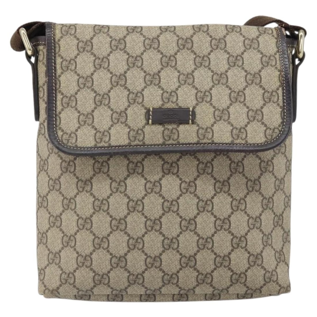 Beige GG Canvas Unisex Flap Messenger Bag by Gucci: Beige GG Canvas Unisex Flap Messenger Bag by Gucci This Gucci Flap Messenger bag features the iconic GG coated canvas in beige, designed for unisex use. The bag displays some signs of wear, including
