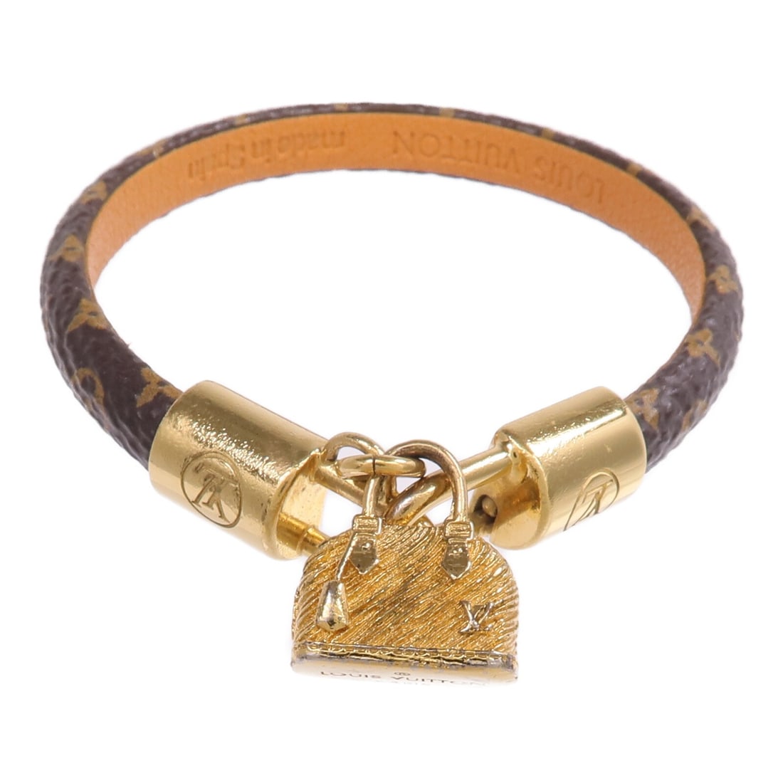 Alma Monogram Brown Bracelet by Louis Vuitton with Gold Tone Hardware: Alma Monogram Brown Bracelet by Louis Vuitton with Gold Tone Hardware This Louis Vuitton Alma bracelet features the iconic Monogram pattern in brown PVC coated canvas. The bracelet is designed for reg