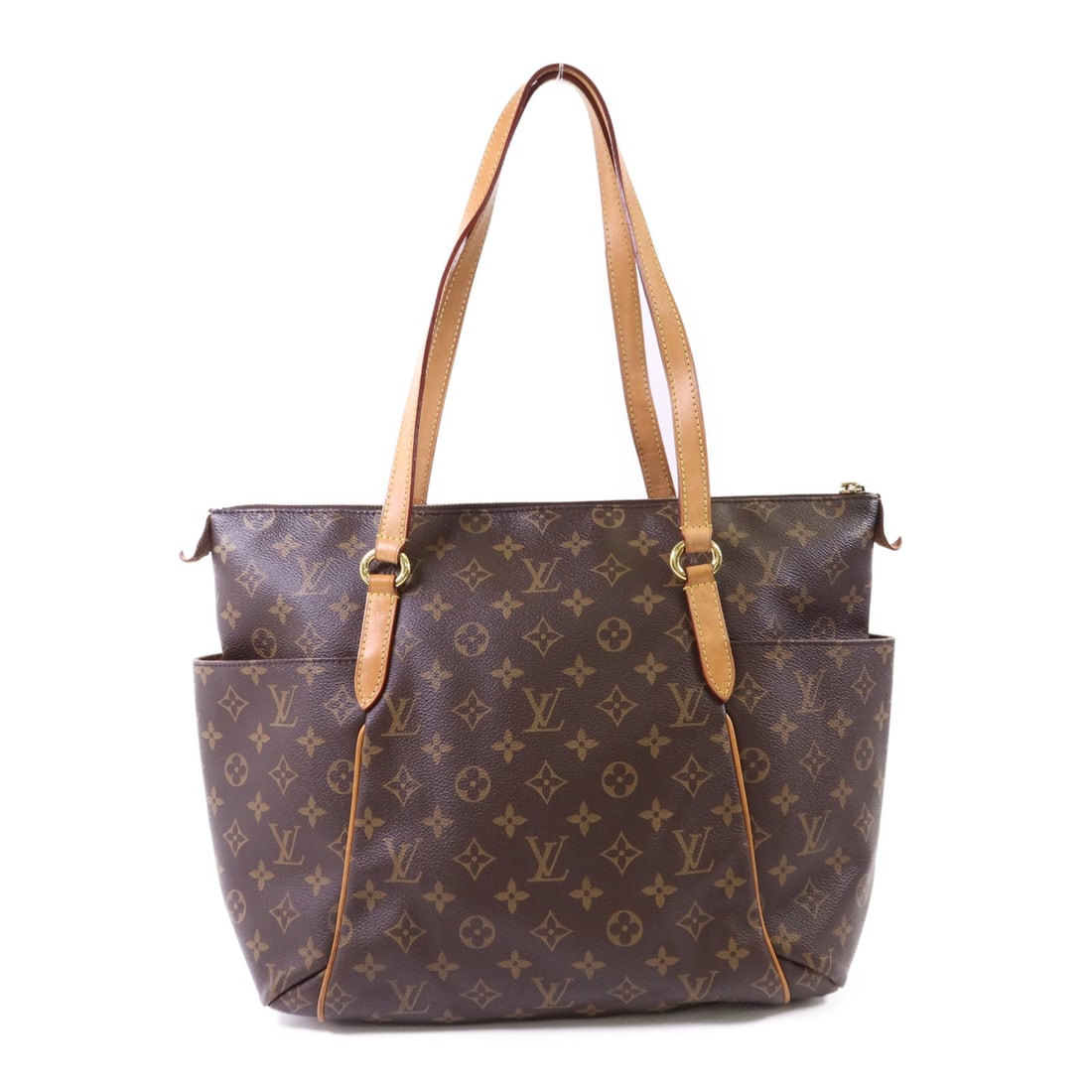 Louis Vuitton Monogram Totally MM Brown Shoulder Tote Bag M56689: Louis Vuitton Monogram Totally MM Brown Shoulder Tote Bag M56689 This Louis Vuitton Totally MM shoulder tote bag features the iconic Monogram brown PVC coated canvas exterior. The bag is designed in a