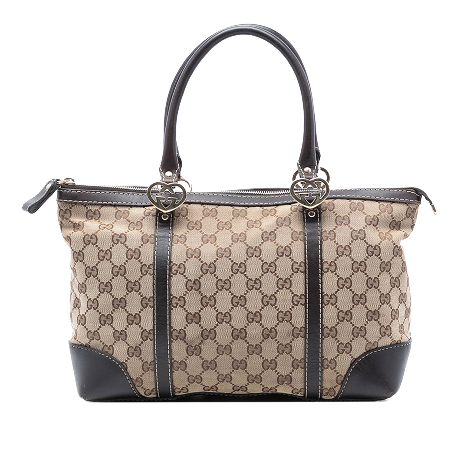 Brown Canvas Tote Bag with Leather Trim GG Canvas Lovely by Gucci: Brown Canvas Tote Bag with Leather Trim GG Canvas Lovely by Gucci This Gucci GG Canvas Lovely Tote features a canvas body with leather trim, rolled leather handles, a top zip closure, and interior zip