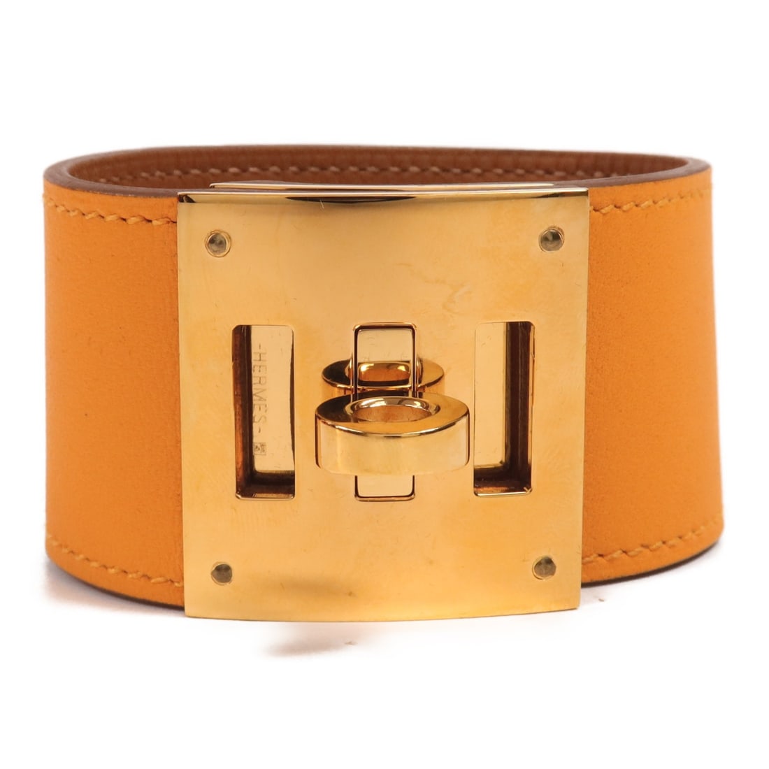 HERMES Kelly Dog Bracelet Yellow Swift Leather GHW: HERMES Kelly Dog Bracelet Yellow Swift Leather GHW Elevate your accessory collection with this HERMES Kelly Dog Bracelet, crafted from luxurious swift leather in a vibrant yellow hue. This exquisite p