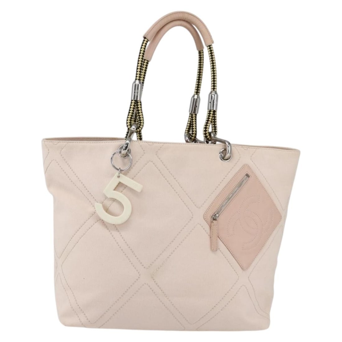 Pink Chanel Cruise Line No 5 Quilted Canvas Tote Bag: Pink Chanel Cruise Line No 5 Quilted Canvas Tote Bag This vintage Chanel Cruise Line No.5 tote is crafted from pink quilted canvas designed for women. It features metal fittings and handles with signs
