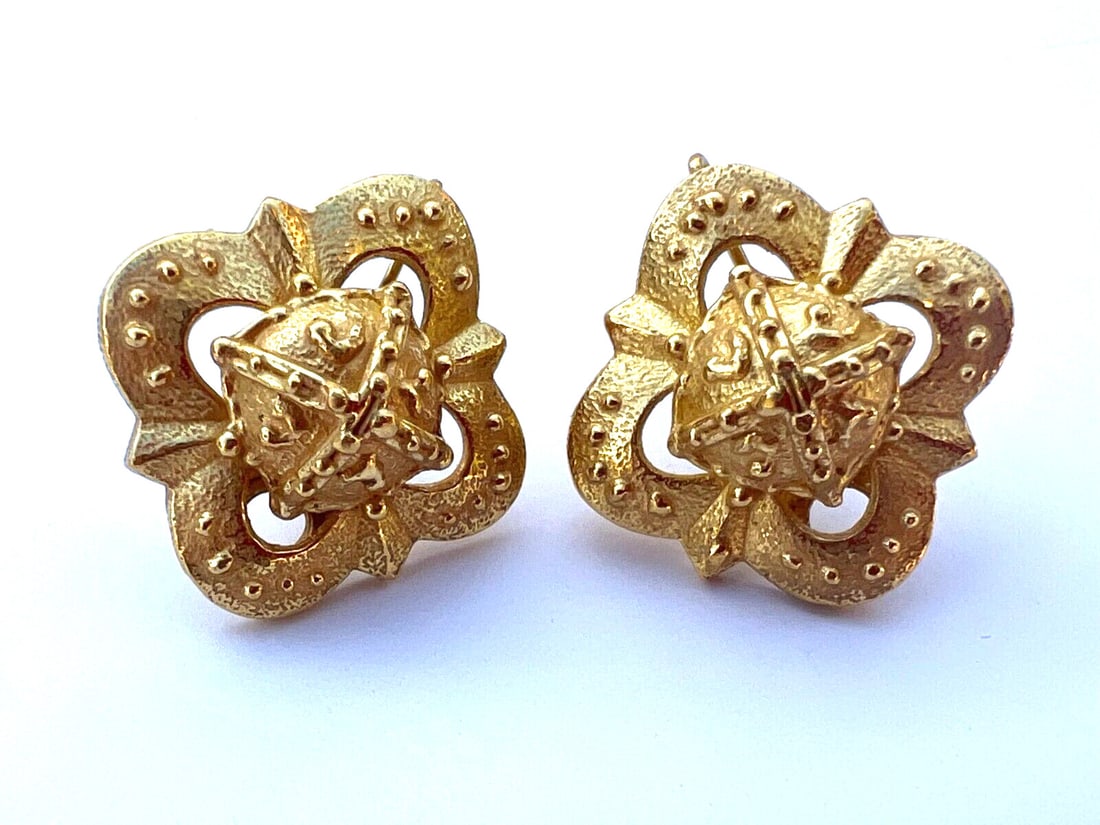 22K Yellow Gold Clip Earrings by Tiana & Co: 22K Yellow Gold Clip Earrings by Tiana & Co Step into elegance with this exquisite pair of earrings from Tiana & Co. Crafted from luxurious 22K yellow gold, these earrings feature a unique clip design