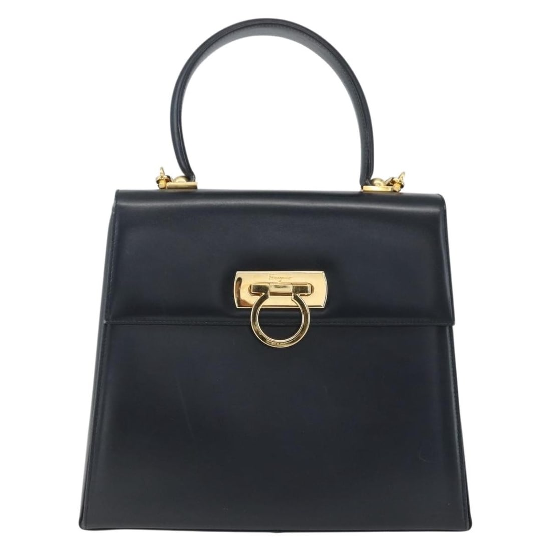 Gancini Navy Leather Convertible Bag by Salvatore Ferragamo: Gancini Navy Leather Convertible Bag by Salvatore Ferragamo This Salvatore Ferragamo Gancini Convertible Top Handle Bag is crafted from navy leather and features both a top handle and a convertible sh