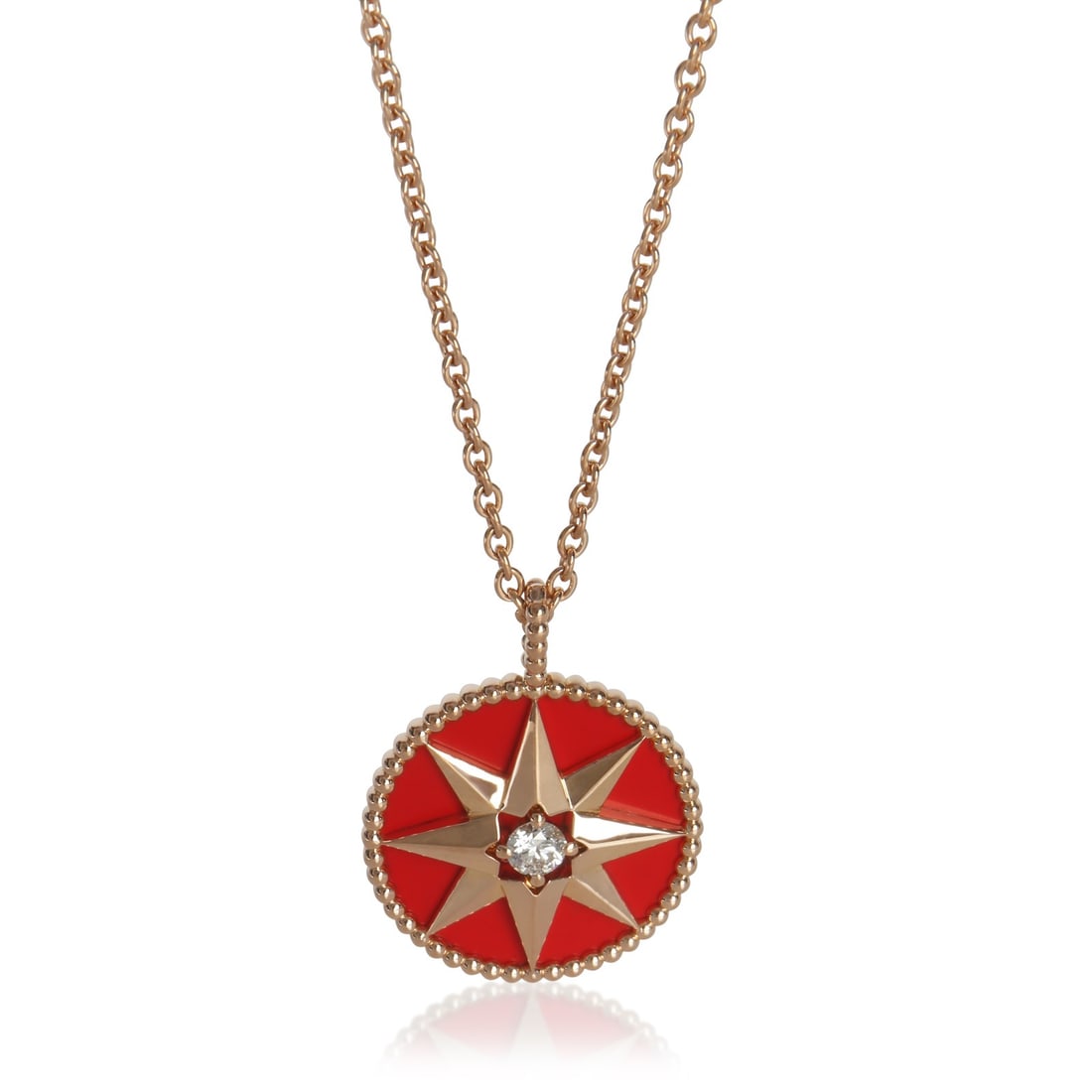 Rose Des Vents Carnelian Diamond Pendant in 18k Rose Gold Medium Model: Rose Des Vents Carnelian Diamond Pendant in 18k Rose Gold Medium Model This Christian Dior Rose Des Vents pendant features a round brilliant shape crafted from 18k rose gold. The pendant showcases a c