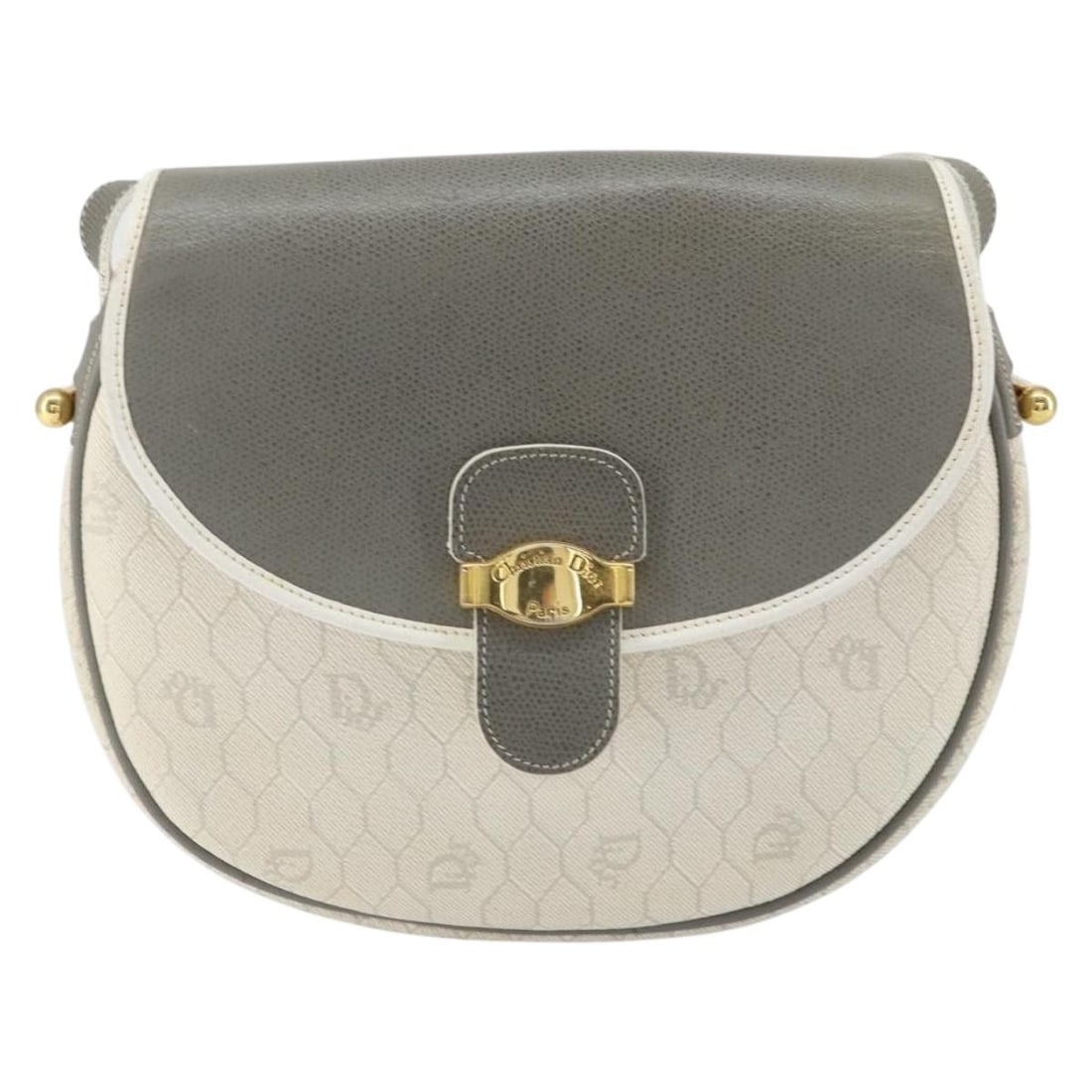 Christian Dior Honeycomb Canvas and Leather Flap Crossbody Bag: Christian Dior Honeycomb Canvas and Leather Flap Crossbody Bag This Christian Dior vintage Honeycomb flap crossbody bag for women features a white canvas body with leather details. The bag measures 22