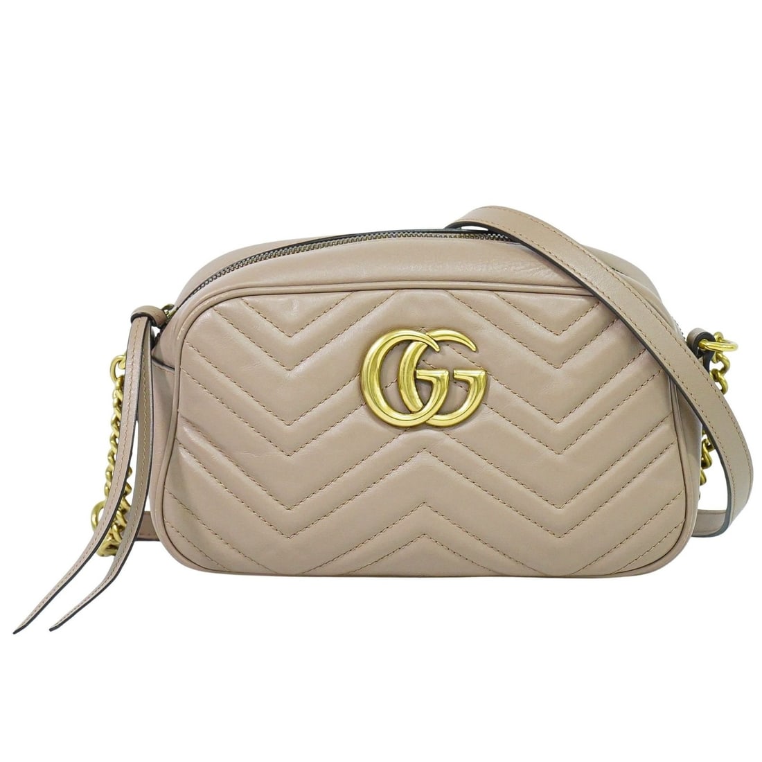 Beige Leather GG Marmont Shoulder Bag by Gucci Italy: Beige Leather GG Marmont Shoulder Bag by Gucci Italy This pre-owned Gucci GG Marmont shoulder bag features beige matelasse leather with a classic design. The bag shows signs of use, including minor co