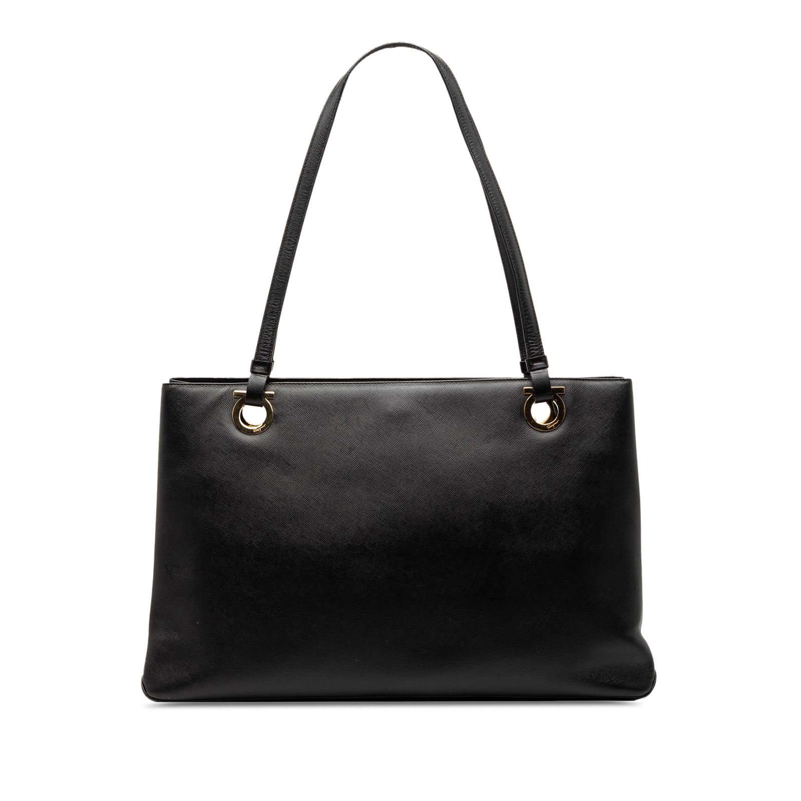 Black Leather Gancini Tote Bag by Ferragamo: Black Leather Gancini Tote Bag by Ferragamo This Ferragamo Leather Gancini Tote features a black leather exterior with flat leather handles and an open top secured by a magnetic snap closure. The inte