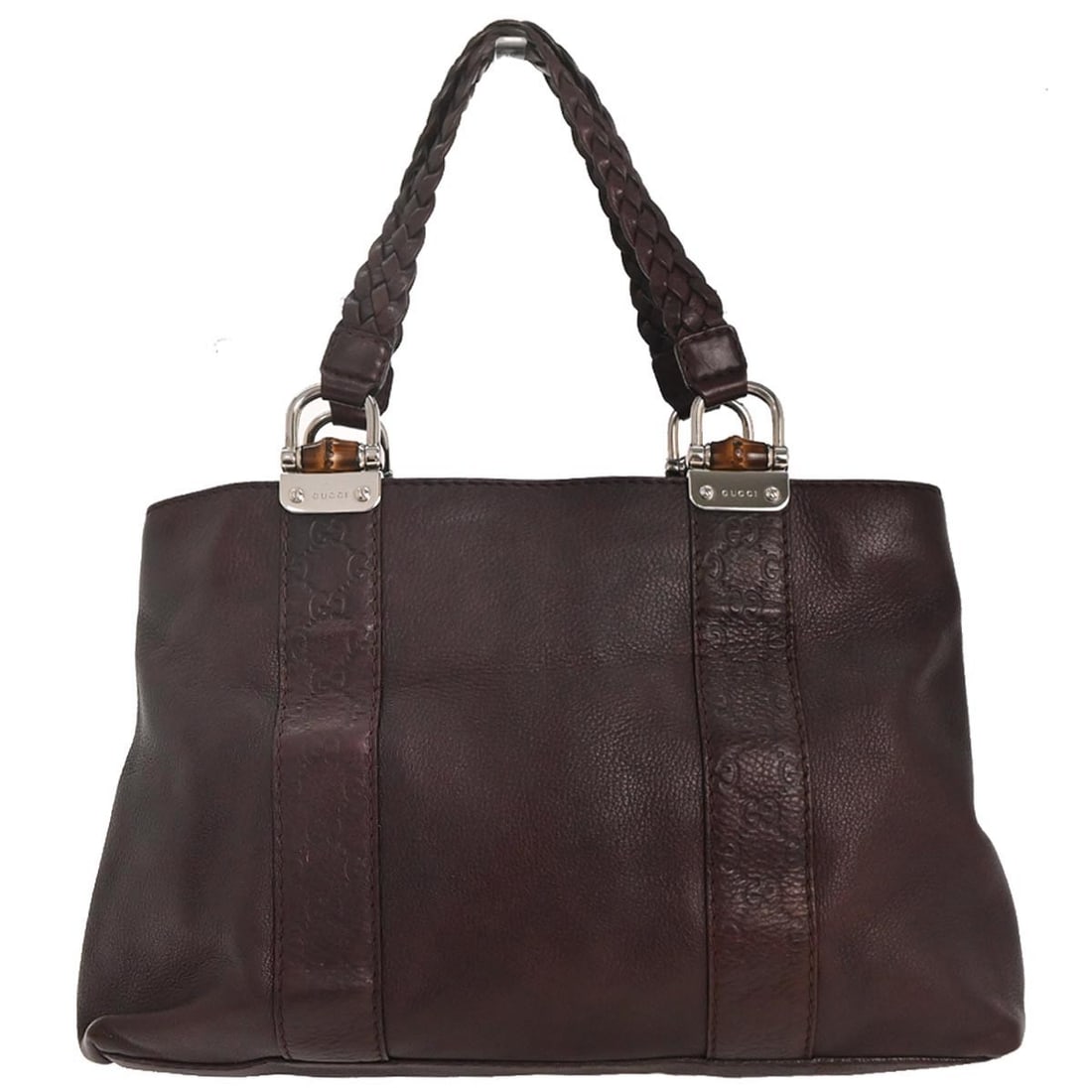 Vintage Gucci Brown Leather Handbag with Bamboo Top Handle: Vintage Gucci Brown Leather Handbag with Bamboo Top Handle This pre-owned Gucci Vintage Bamboo Handle Bag features a brown leather exterior and iconic bamboo top handles. Designed for women, the bag i